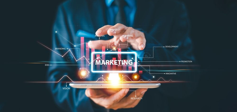 Hands holding a tablet with glowing marketing graphics and star-rating icons, representing online customer reviews.