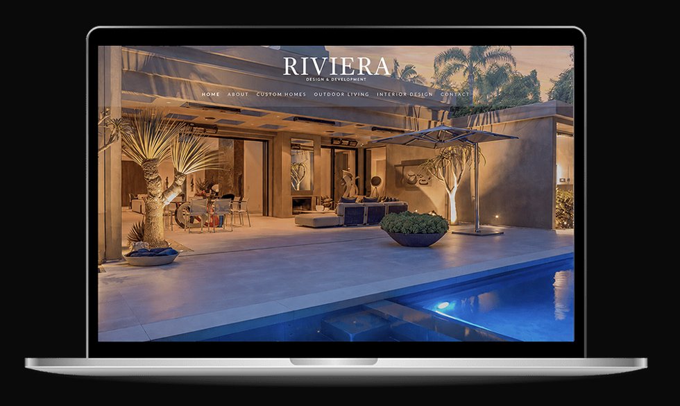 Laptop showing a website design example for a local contractor and luxury home builder — the Riviera site.